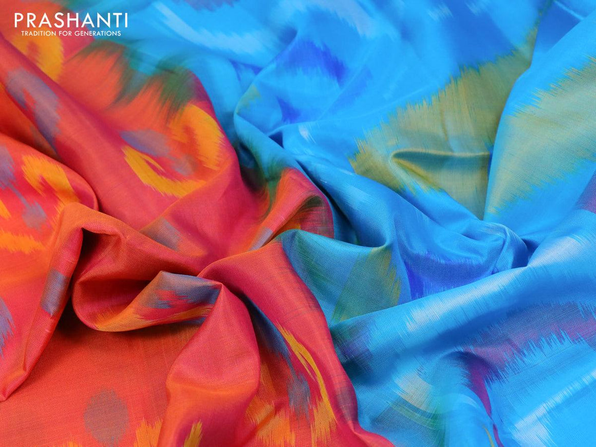 Ikat soft silk saree dual shade of pinkish orange and blue with allover ikat butta weaves and zari woven border - {{ collection.title }} by Prashanti Sarees