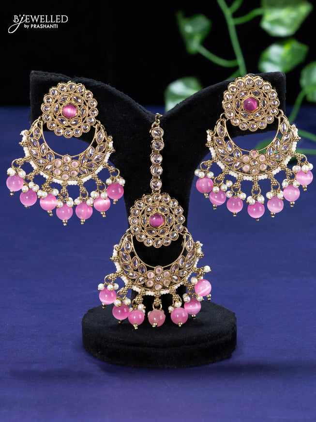 Kundan baby pink choker with baby pink beads hangings & pearl hangings and maang tikka - {{ collection.title }} by Prashanti Sarees