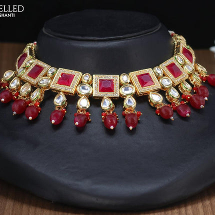 Kundan necklace with maroon stones and maang tikka - {{ collection.title }} by Prashanti Sarees