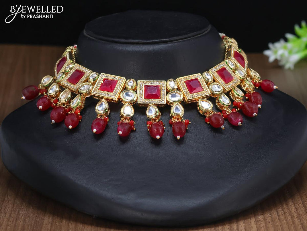 Kundan necklace with maroon stones and maang tikka - {{ collection.title }} by Prashanti Sarees