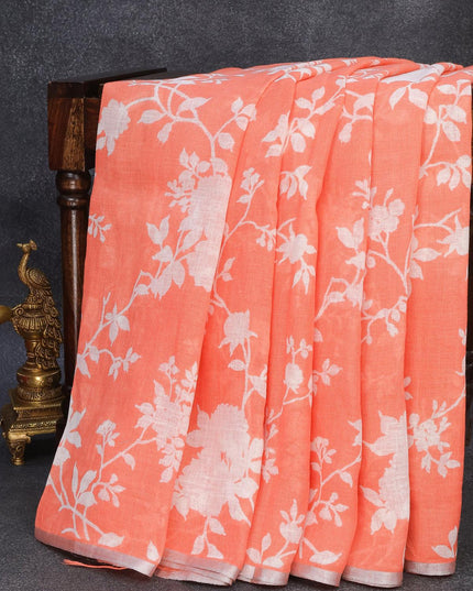 Linen cotton saree peach orange with allover floral prints and small silver zari woven border - {{ collection.title }} by Prashanti Sarees