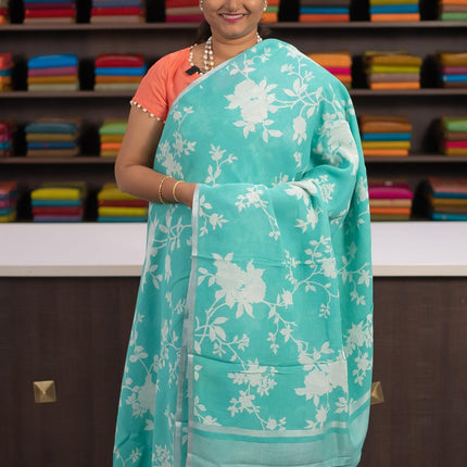Linen cotton saree teal blue with allover floral prints and small silver zari woven border - {{ collection.title }} by Prashanti Sarees