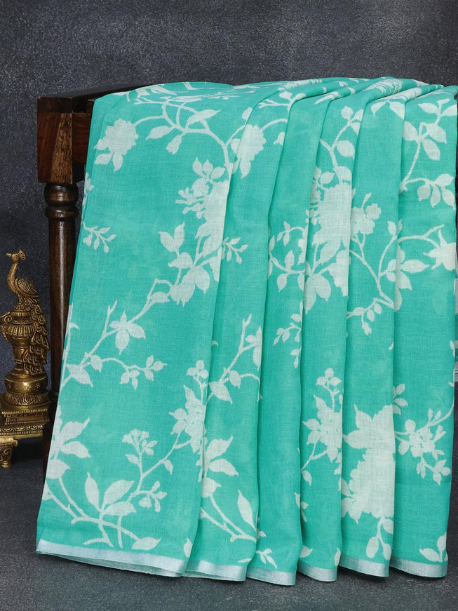 Linen cotton saree teal blue with allover floral prints and small silver zari woven border - {{ collection.title }} by Prashanti Sarees