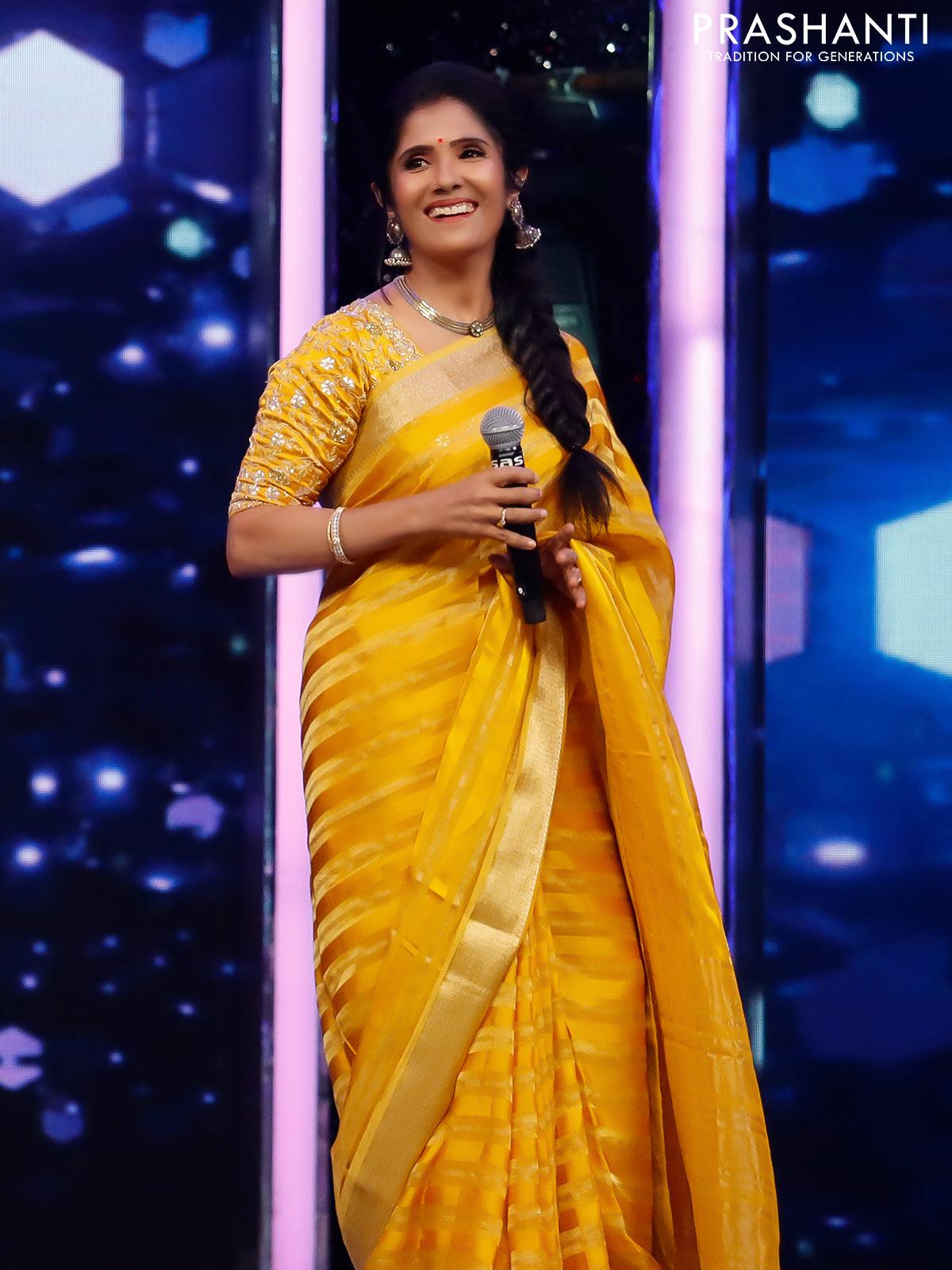 Organza silk saree yellow with allover zari woven stripes pattern