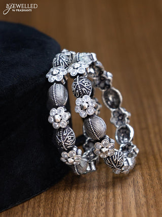 Oxidised bangles floral design with cz stone