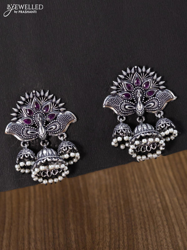 Oxidised jhumka peacock design with pink kemp stones and pearl hangings - {{ collection.title }} by Prashanti Sarees