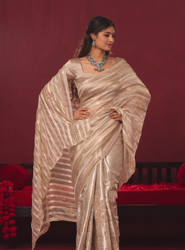 Tissue organza silk saree with allover stripes & embroidery