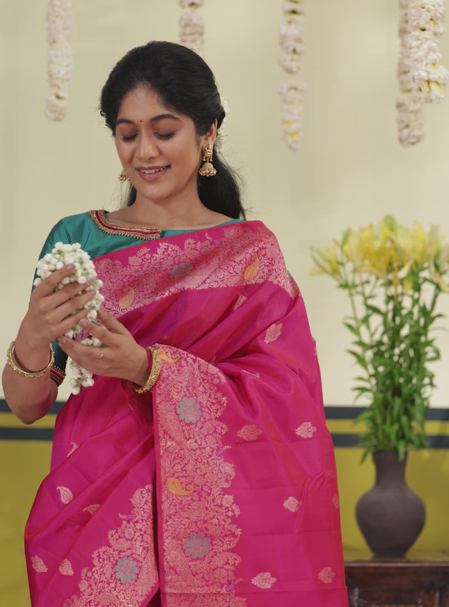 Pink pure kanchipuram silk saree with allover zari woven buttas & rich zari woven border