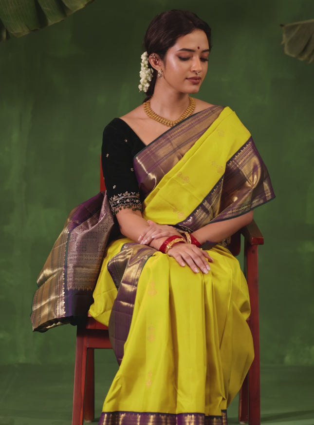 Yellow-Peacock green Pure kanchipuram silk saree With zari woven buttas