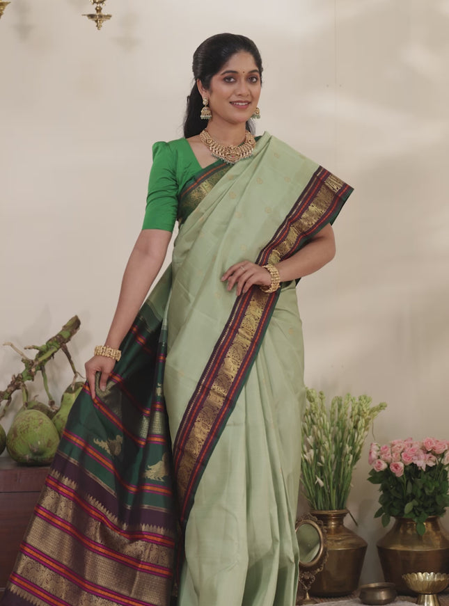Pastel Green-Deep wine Pure kanchipuram silk saree with zari woven buttas & elephant zari woven border