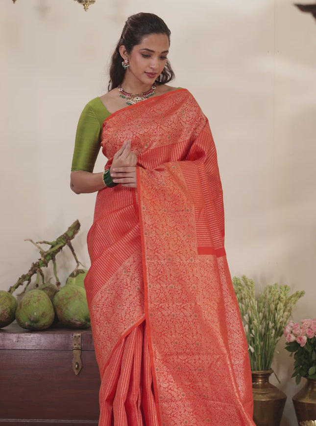 Orange Pure kanchipuram silk saree with allover zari woven brocade weaves & zari woven border