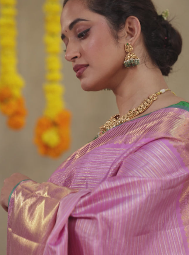 Light pink-Green Pure Kanchipuram silk saree With allover zari stripes pattern & long zari woven border