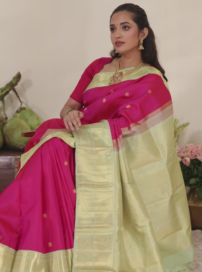 Pink-Light green Pure kanchipuram silk saree with zari woven buttas & zari woven border