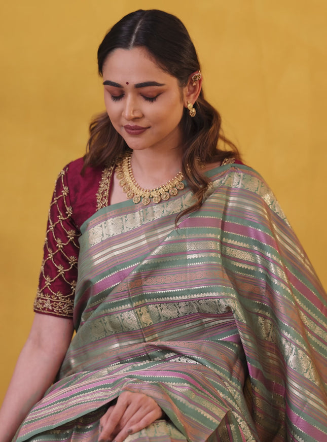 Pastel Green Pure Kanchipuram Silk Saree With Thread & Zari Stripes Pattern