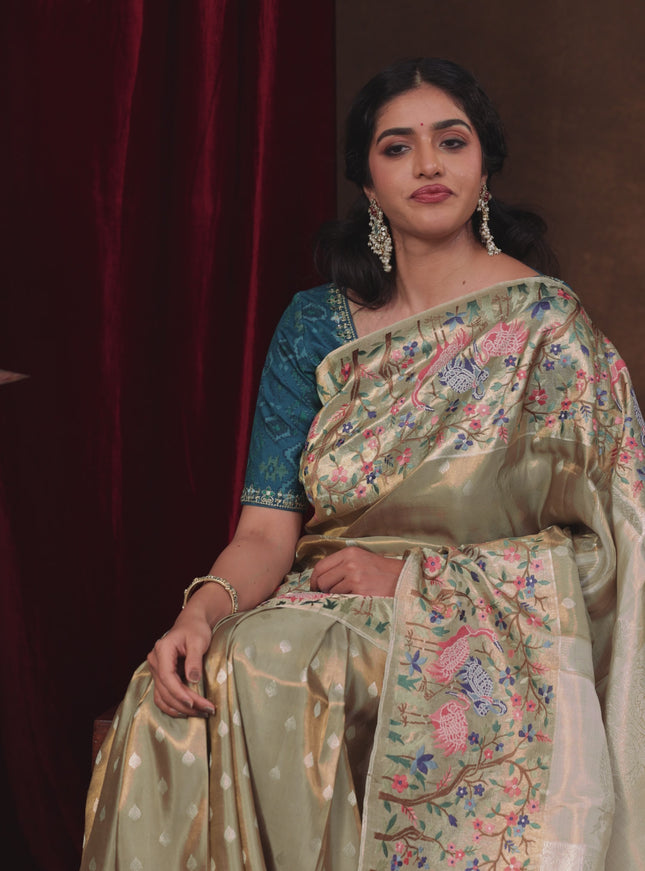 Elaichi Green Pure Kanchipuram Silk Saree With Silver Zari Buttas & Border Embroidery