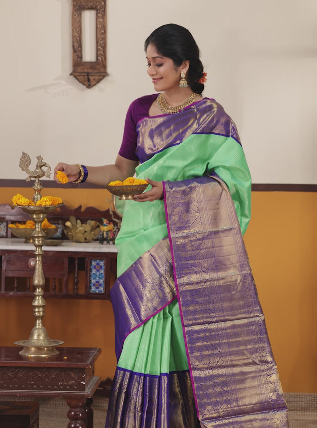 Teal-Blue Pure kanchipuram silk saree with Allover zari weaves and long rich zari border