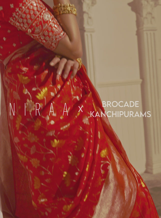 Pure kanchipuram silk saree reddish pink with floral motif zari weaves and silver zari woven border