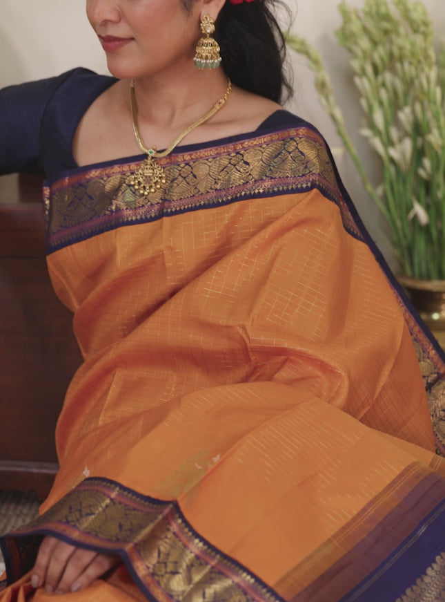 Orange-Navy Blue Pure kanchipuram silk saree with Allover zari checks & zari woven korvai border