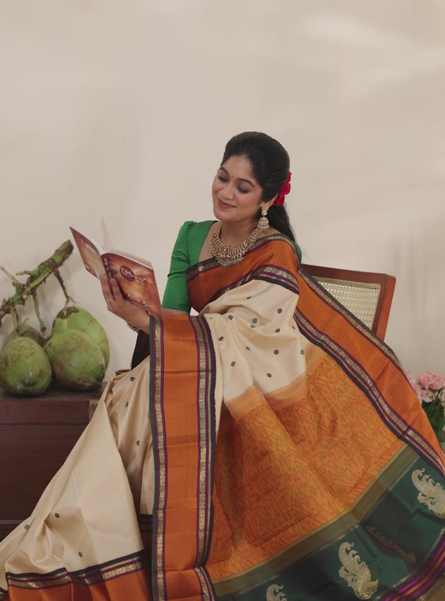 Cream-Deep jamun Pure kanchipuram silk saree with thread woven buttas & zari woven border