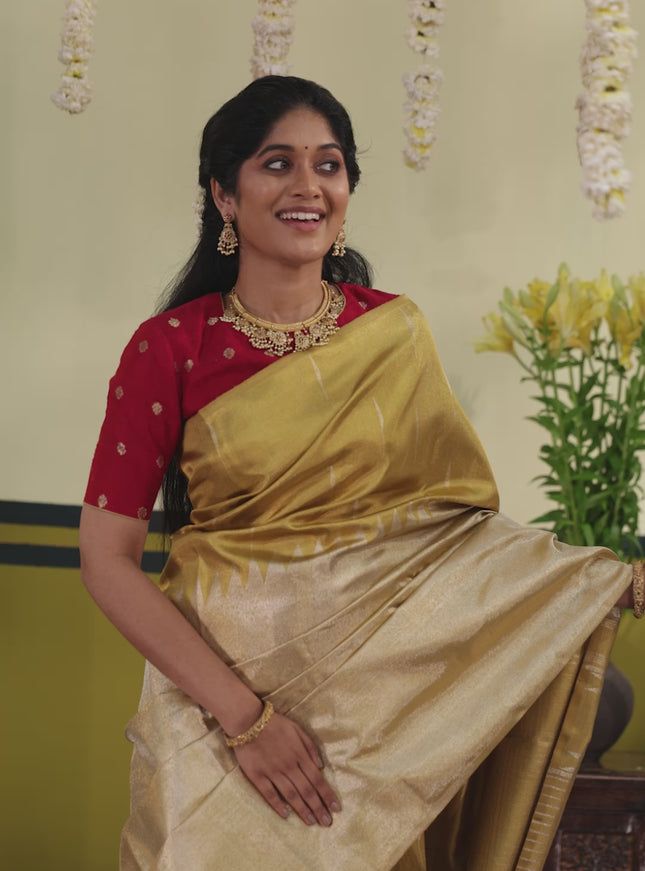 Gold Tissue kanchipuram silk saree with zari woven brocade weaves & rising temple border