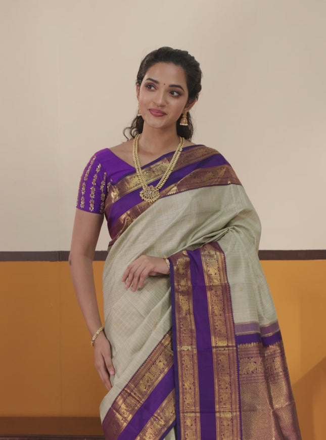 Pista Green-Purple Pure Kanchipuram Silk Saree with Allover zari checks & buttas and Rettapet zari woven border