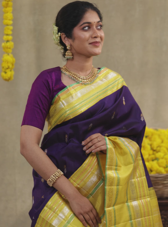 Blue-Yellow Pure Kanchipuram silk saree with zari woven buttas & long zari woven border