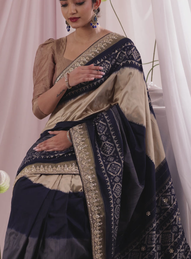 Grey-navy blue pochampally silk saree with allover ikat weaves and Embroidered border