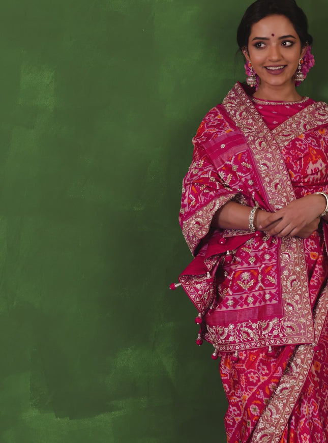 Pink Pochampally silk saree with allover ikat weaves and Embroidered border