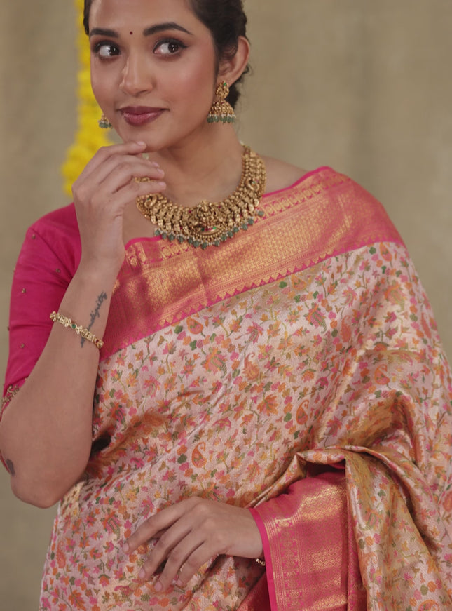 Mild peach-Pink Pure kanchipuram tissue silk saree with allover mina weaves & zari woven border