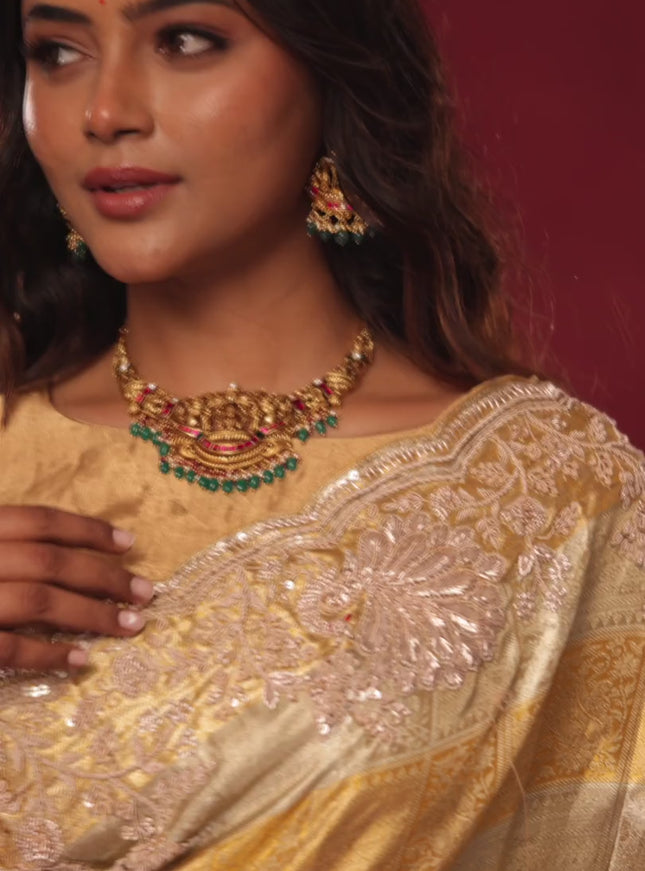 Pure tissue kanchipuram silk saree with allover zari weaves & border embroidery