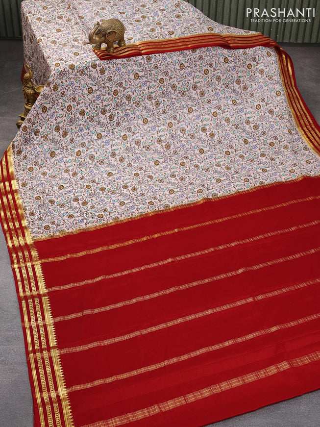 Printed crepe silk sraee pastel peach and red with allover floral prints and zari woven border - {{ collection.title }} by Prashanti Sarees