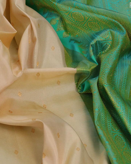 Pure kanjivaram silk saree cream and dual shade of teal green with allover zari woven buttas and zari woven border - {{ collection.title }} by Prashanti Sarees
