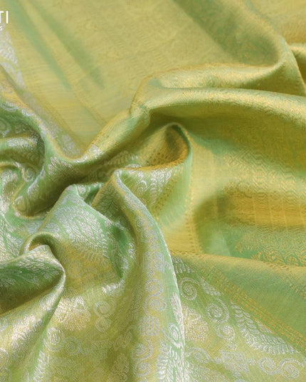 Pure kanjivaram tissue silk saree pista green with allover silver zari woven brocade weaves and long rich zari woven border - {{ collection.title }} by Prashanti Sarees