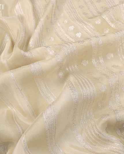 Pure tissue organza silk saree cream and red pink with allover zari weaves and lace work border & embroidery work readymade blouse - {{ collection.title }} by Prashanti Sarees