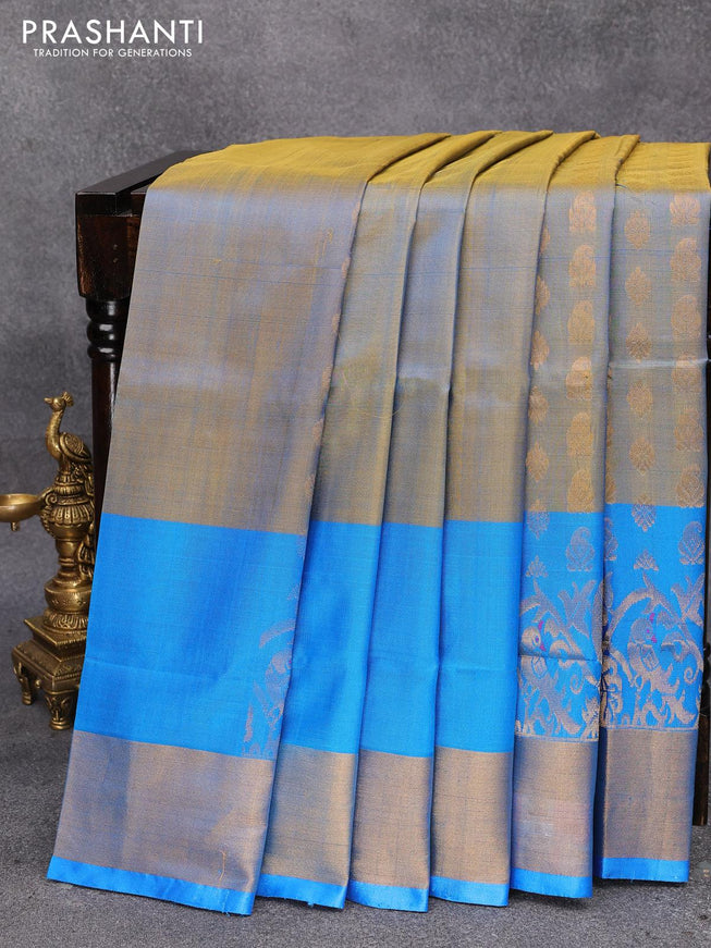 Pure uppada silk saree dual shade of bluish yellow and blue with allover zari woven buttas weaves and long peacock design zari woven border - {{ collection.title }} by Prashanti Sarees