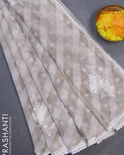 Semi orangza saree off white and grey with allover ikat prints & embroidery buttas and crocia lace border - {{ collection.title }} by Prashanti Sarees