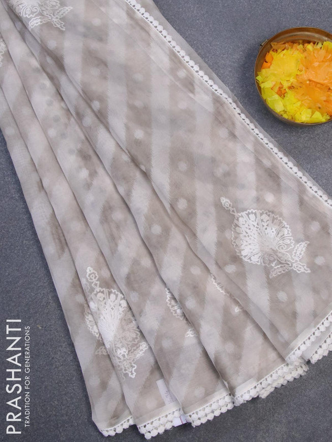 Semi orangza saree off white and grey with allover ikat prints & embroidery buttas and crocia lace border - {{ collection.title }} by Prashanti Sarees