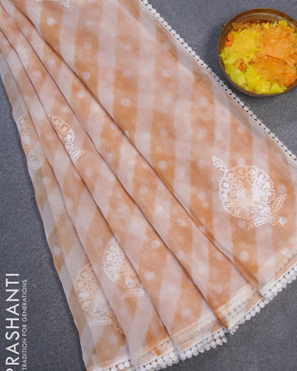 Semi orangza saree off white and rust shade with allover ikat prints & embroidery buttas and crocia lace border - {{ collection.title }} by Prashanti Sarees