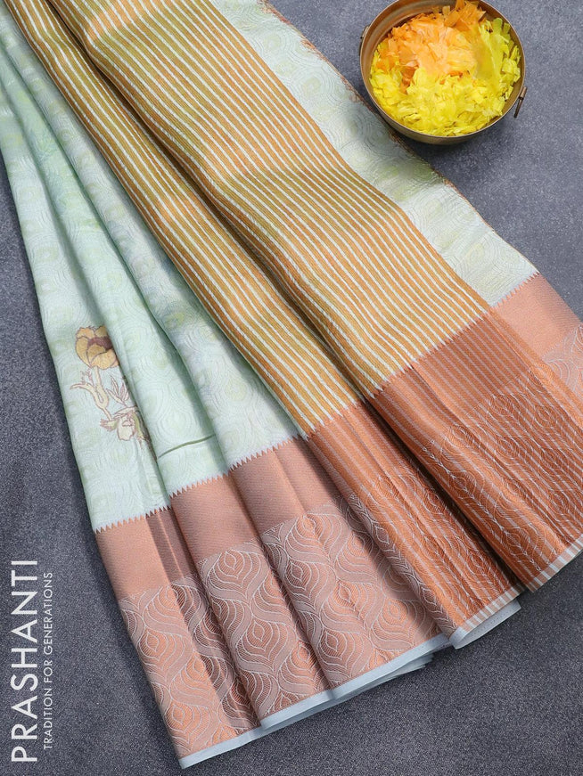 Semi tussar saree pastel green shade with allover self emboss & floral digital prints and copper zari woven border - {{ collection.title }} by Prashanti Sarees