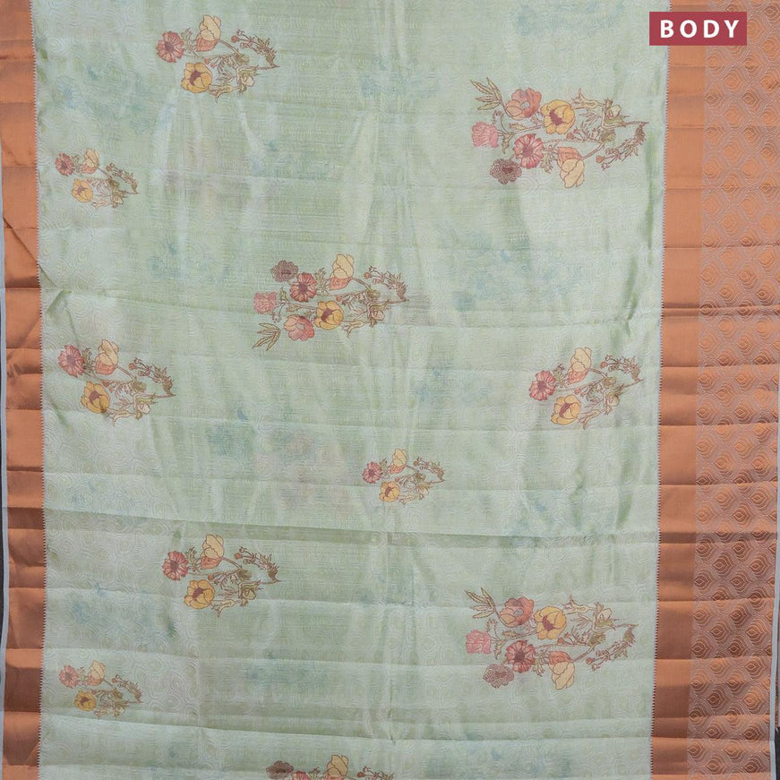 Semi tussar saree pastel green shade with allover self emboss & floral digital prints and copper zari woven border - {{ collection.title }} by Prashanti Sarees
