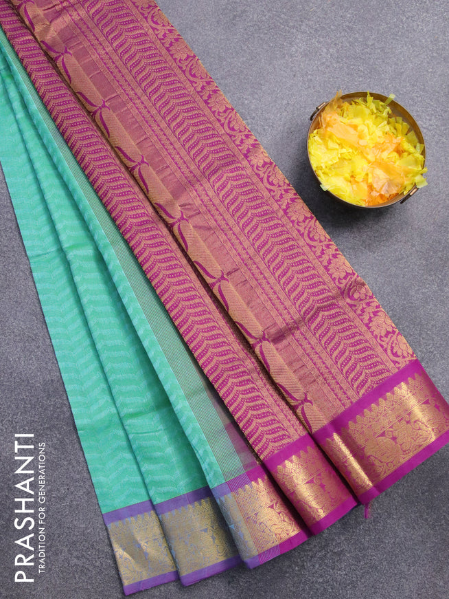 Silk cotton saree dual shade of teal blue and purple with allover self emboss jacquard and floral & paisley zari woven border - {{ collection.title }} by Prashanti Sarees