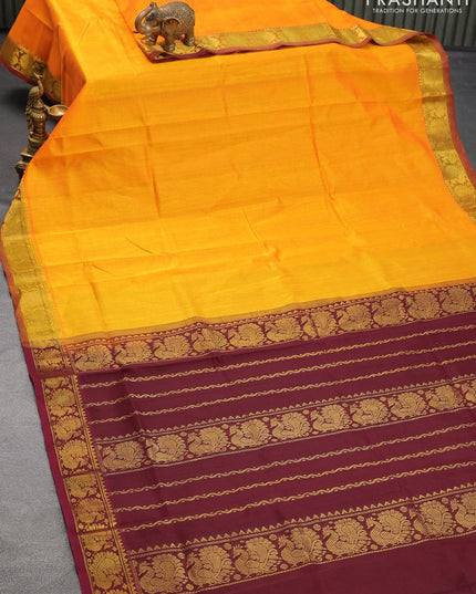 Silk cotton saree dual shade of yellwoush orange and deep maroon with plain body and annam zari woven border - {{ collection.title }} by Prashanti Sarees