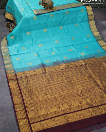 Silk cotton saree teal blue and deep maroon with allover self emboss & annam zari buttas and annam zari woven border - {{ collection.title }} by Prashanti Sarees