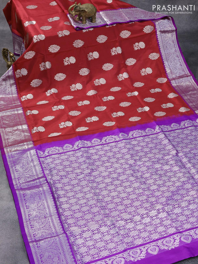 Red striped Venkatagiri silk saree, traditional zari design border, and geometric patterned pallu