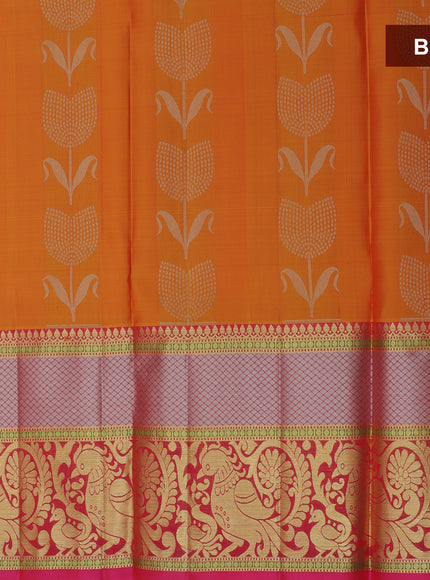 Pure silk half saree mango orange with allover silver zari floral buttas and contrast dark pink blouse & Dupatta