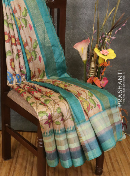 Semi linen saree beige and teal blue with allover floral prints and simple border