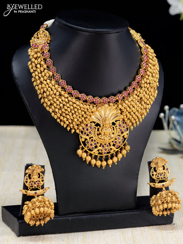 Antique necklace lakshmi design with pink kemp stone and golden beads hanging