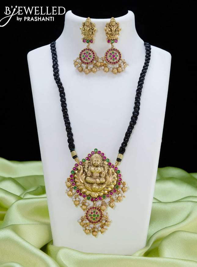 Black thread necklace with kemp stone and antique lakshmi pendant