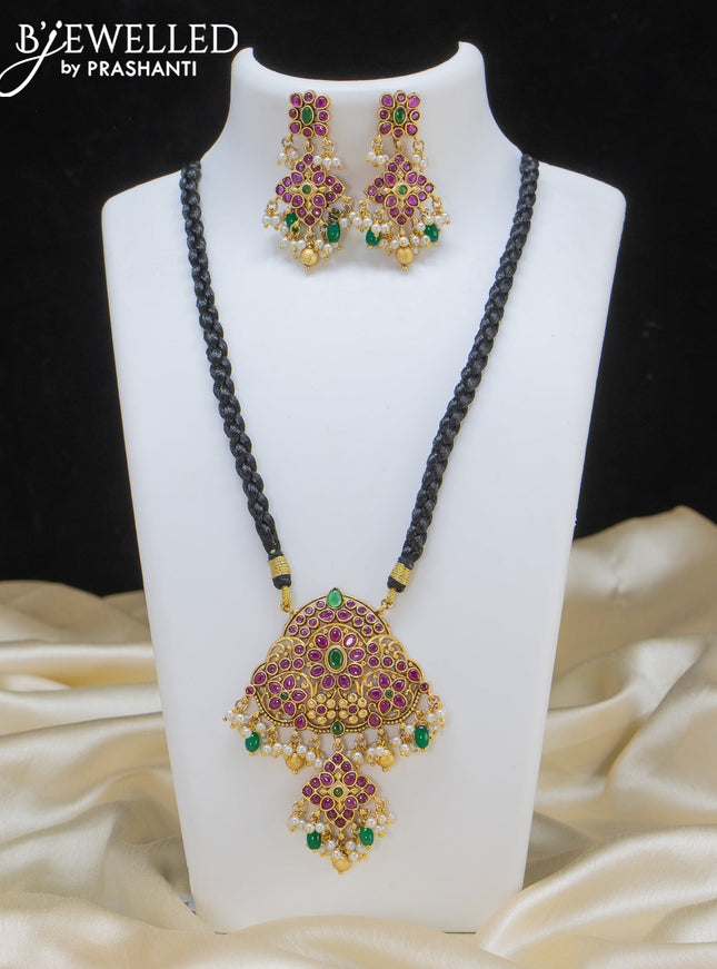 Black thread necklace with kemp stone and pearl hangings