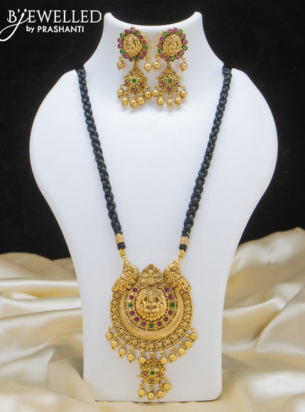 Black thread necklace with lakshmi pendant and golden beads hangings